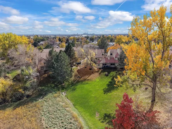 a picture of a room with a white wall and a picture