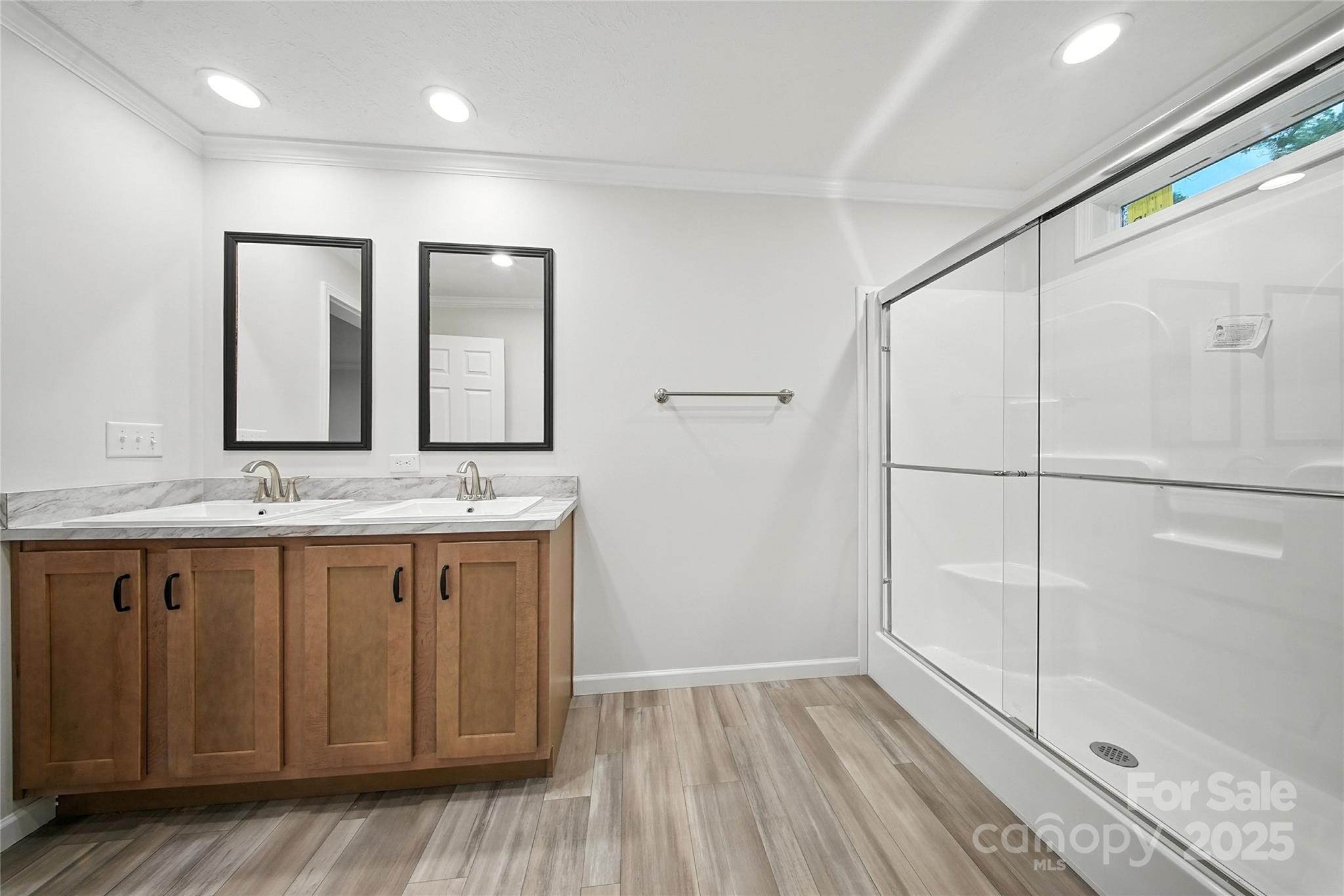 124 Dayton Road Dallas, NC 28034 - Photo 11 of 21 a bathroom with a granite countertop sink mirror and vanity