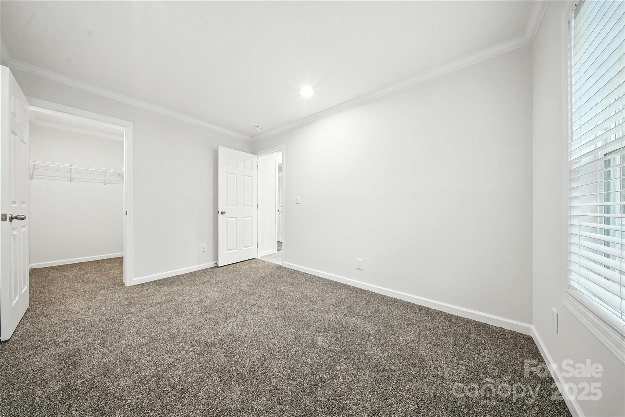 124 Dayton Road Dallas, NC 28034 - Photo 12 of 21 an empty room with windows