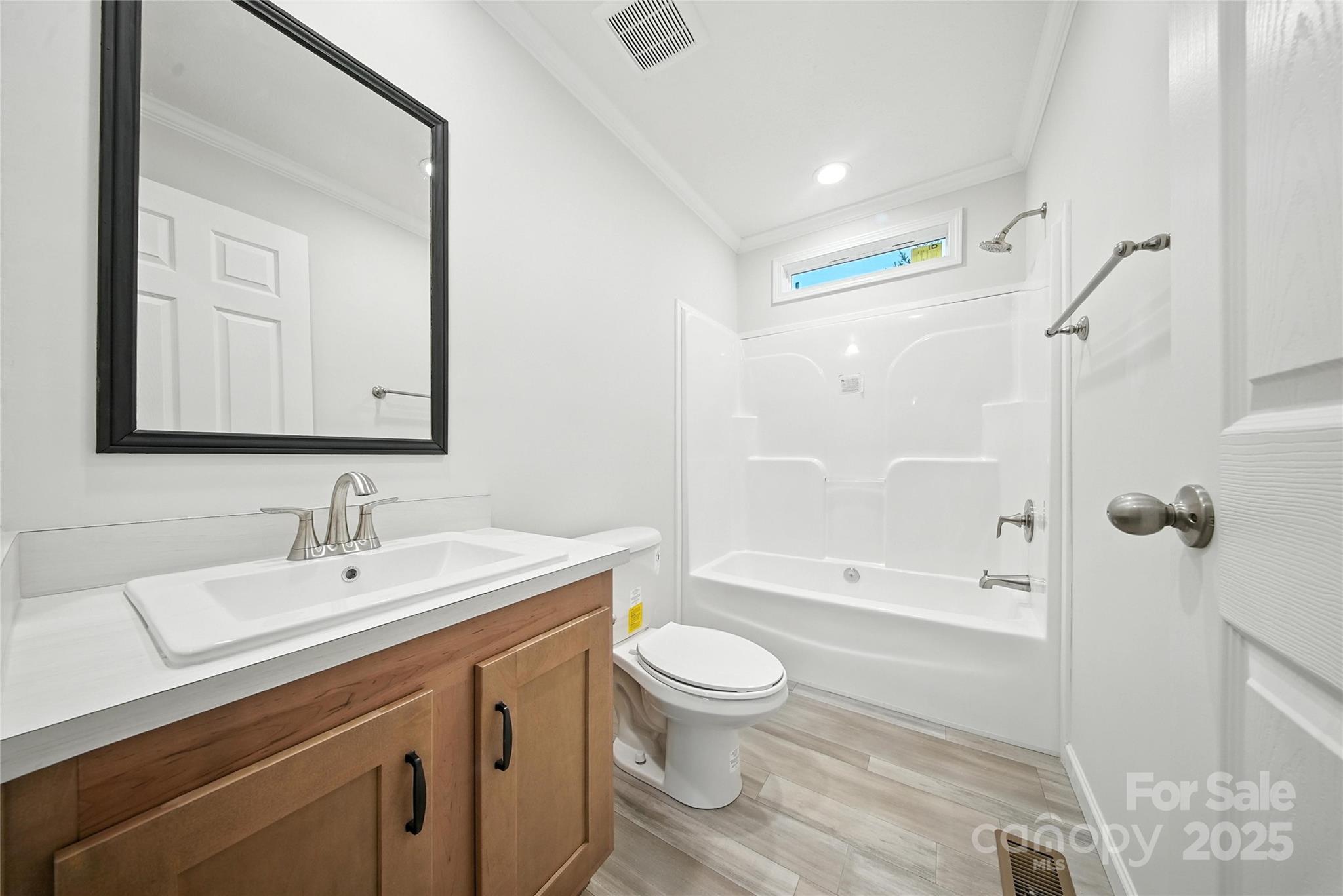 124 Dayton Road Dallas, NC 28034 - Photo 15 of 21 a bathroom with a sink a toilet and shower