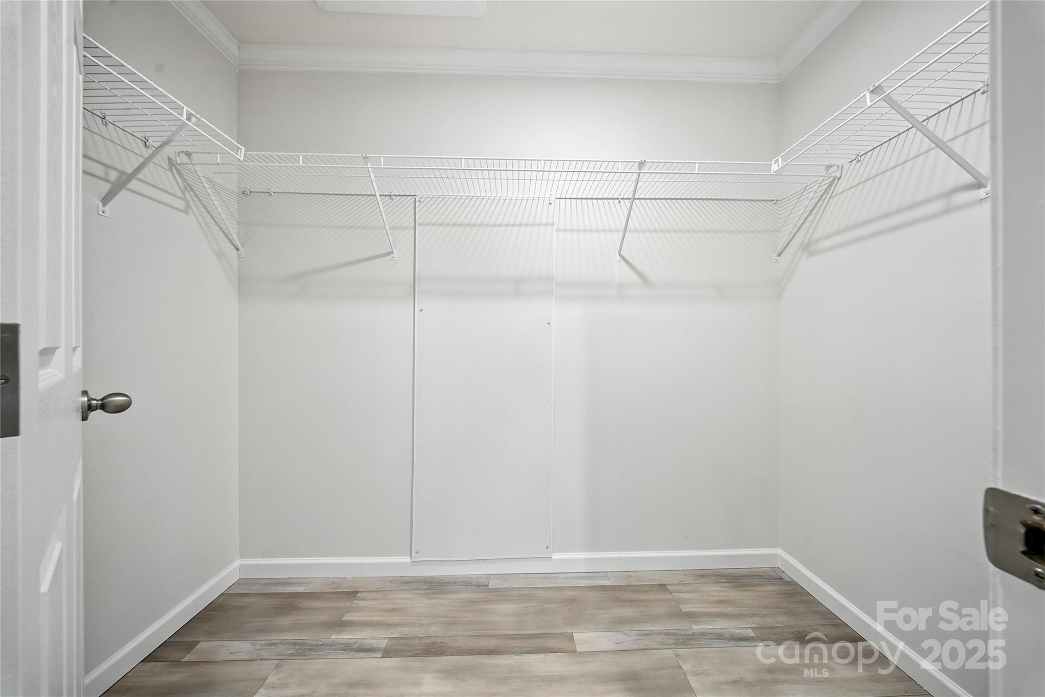 124 Dayton Road Dallas, NC 28034 - Photo 9 of 21 a view of a room with racks on the wall