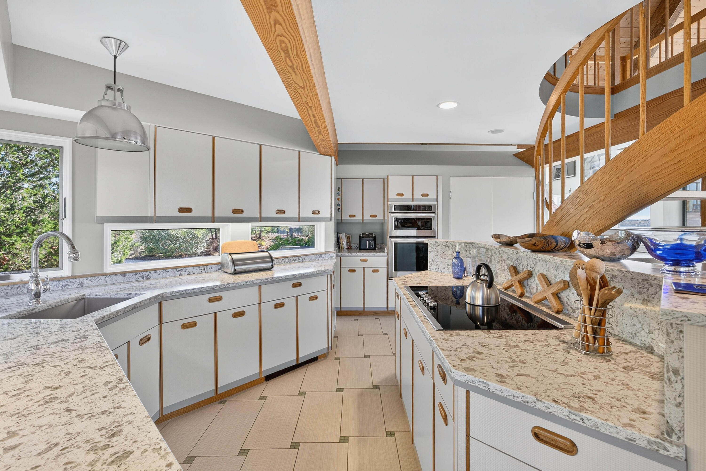 344 King Phillip Road Wellfleet, MA 02667 - Photo 30 of 72 a kitchen with granite countertop a sink a counter top space appliances and cabinets