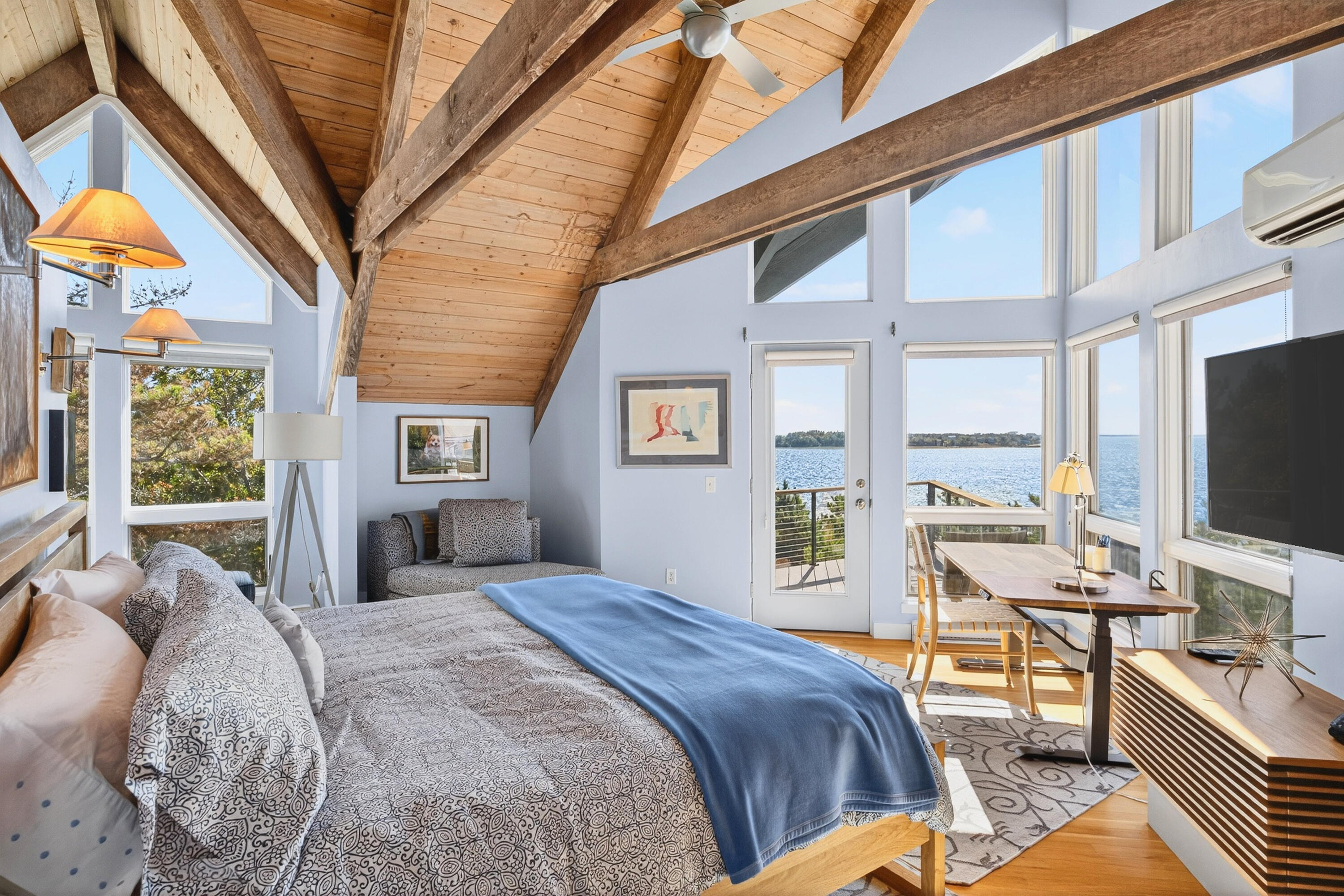 344 King Phillip Road Wellfleet, MA 02667 - Photo 33 of 72 a bedroom with a bed and a flat screen tv