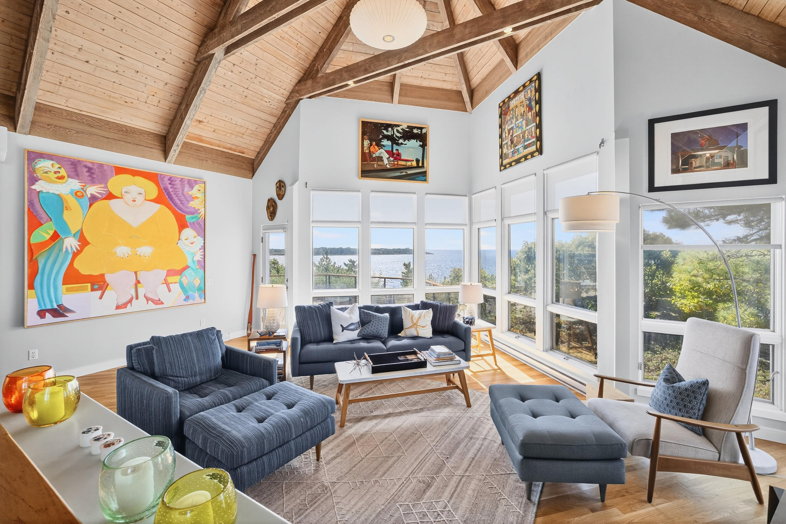 344 King Phillip Road Wellfleet, MA 02667 - Photo 4 of 72 a living room with furniture and a floor to ceiling window