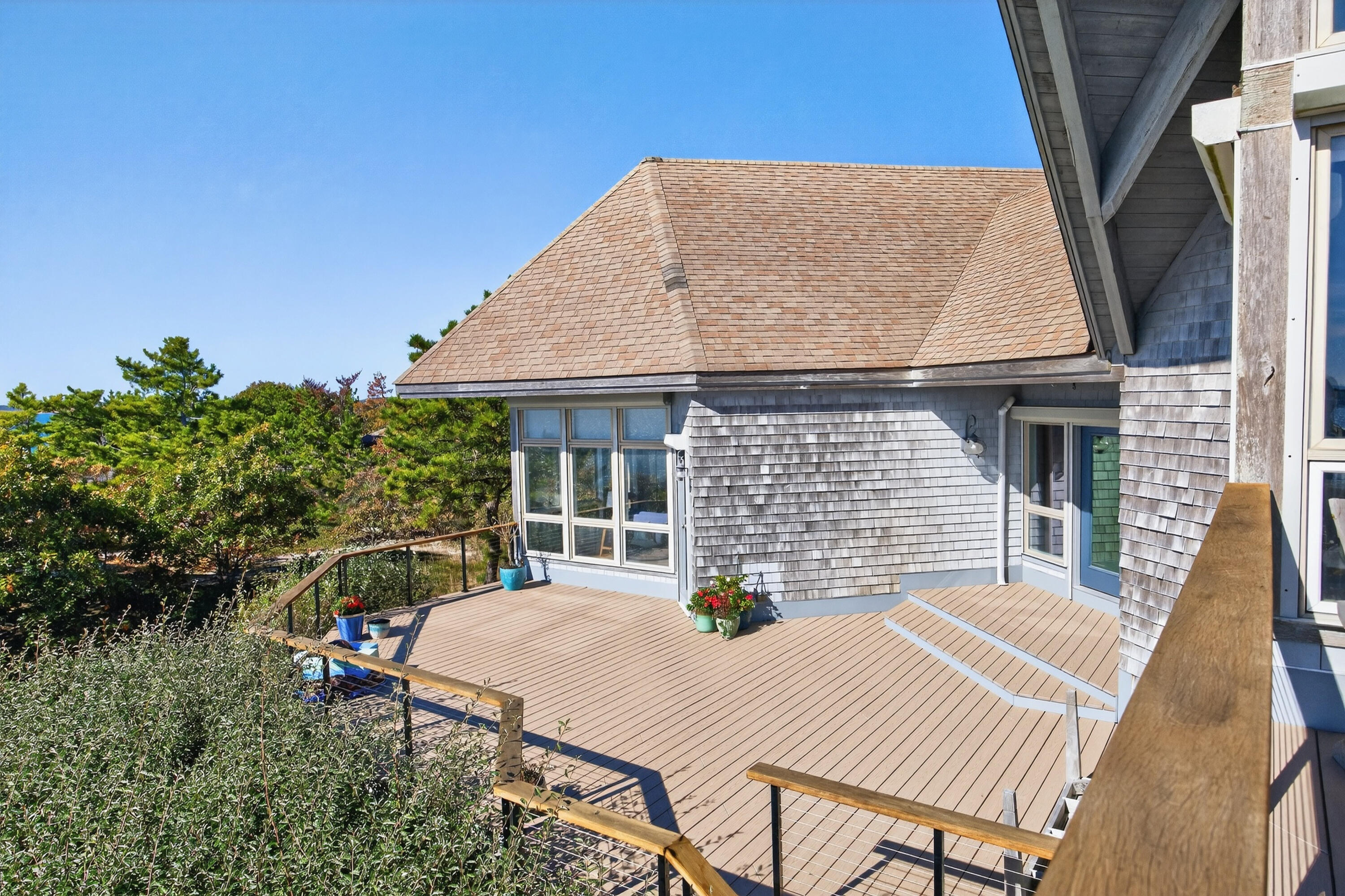 344 King Phillip Road Wellfleet, MA 02667 - Photo 58 of 72 a view of a house with backyard and sitting area