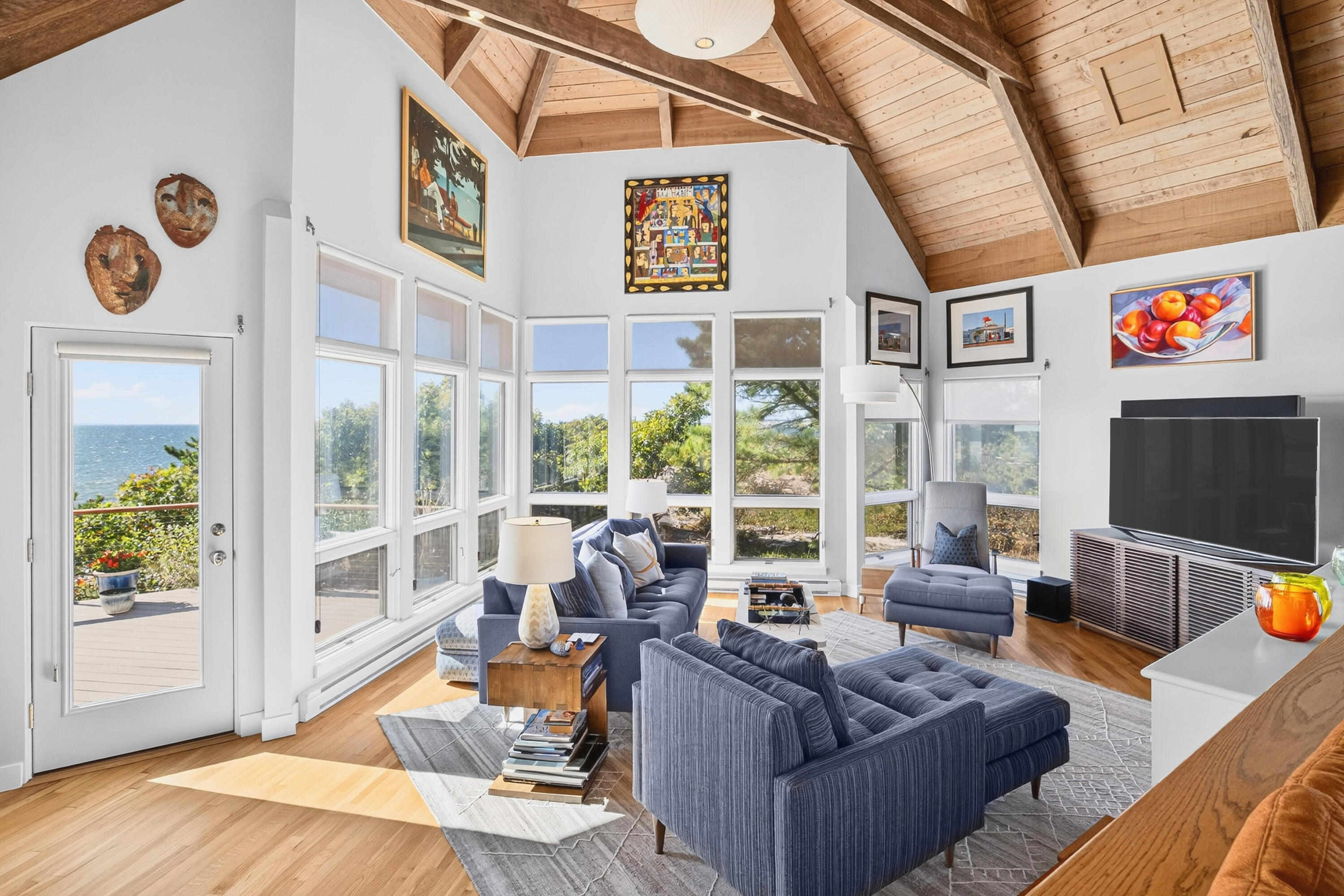 344 King Phillip Road Wellfleet, MA 02667 - Photo 6 of 72 a living room with furniture and a flat screen tv