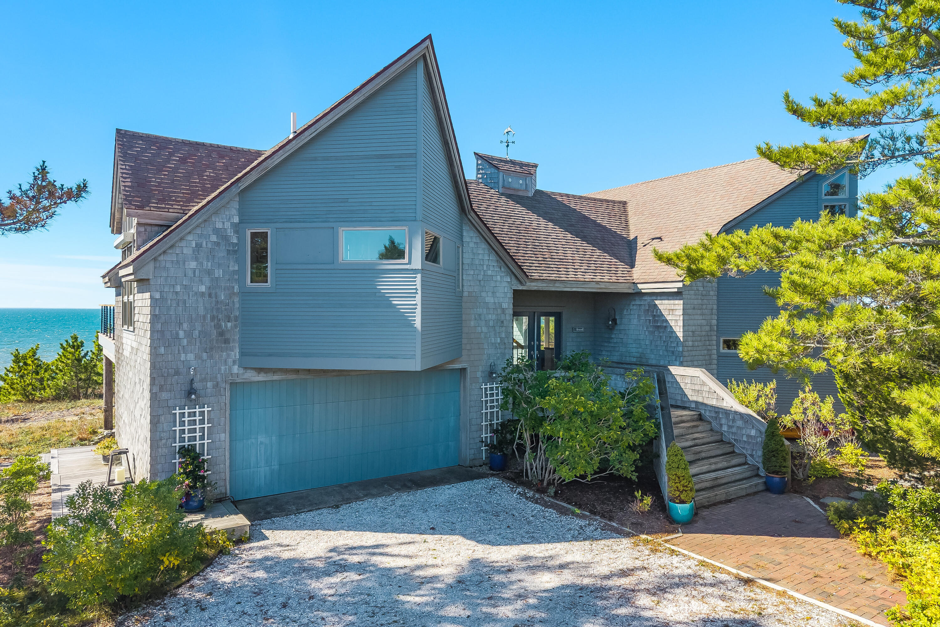 344 King Phillip Road Wellfleet, MA 02667 - Photo 64 of 72 a front view of a house with a yard