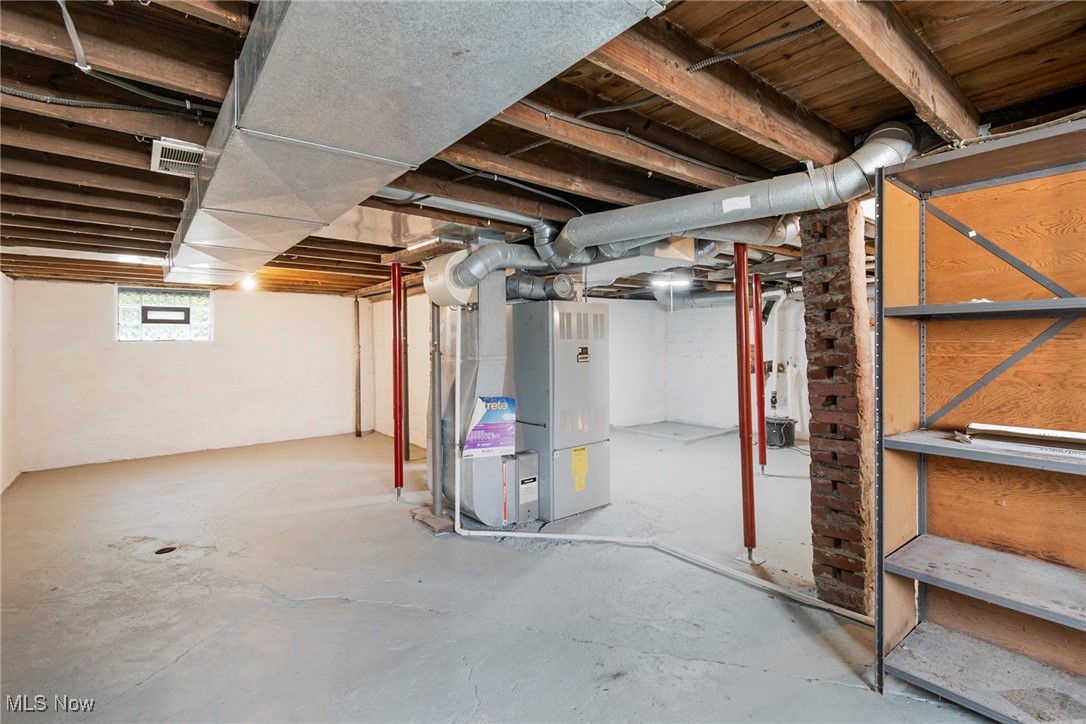 8131 Struthers Road Lowellville, OH 44436 - Photo 35 of 48 Basement with heating unit