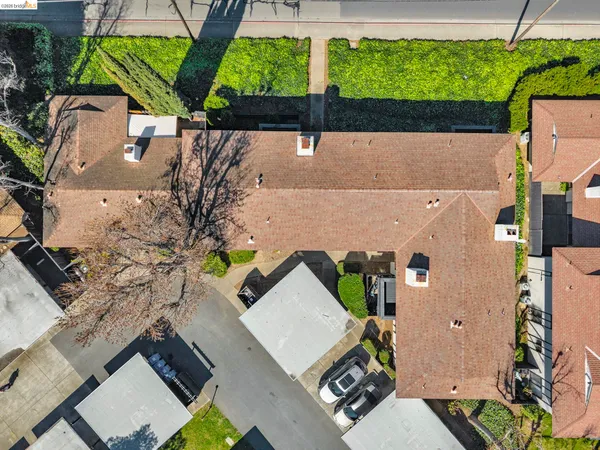 an aerial view of house with yard