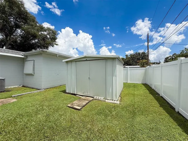 a view of a backyard of a house