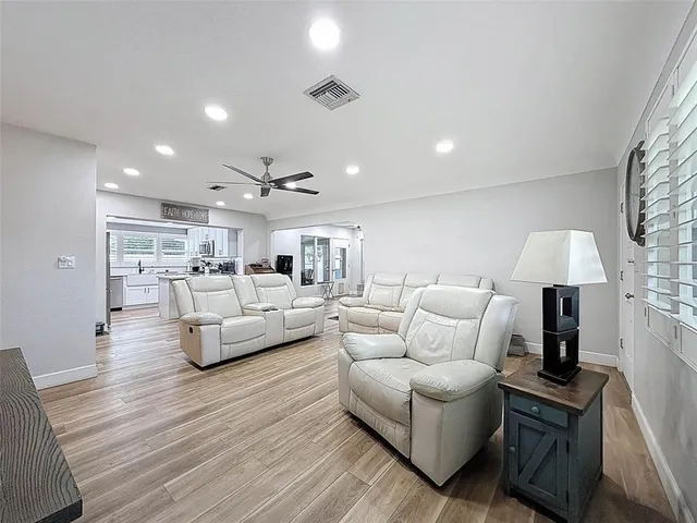 a view of a kitchen with cabinets