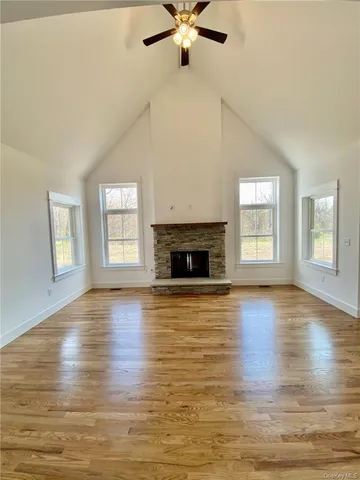 a view of kitchen with stainless steel appliances granite countertop sink and cabinet