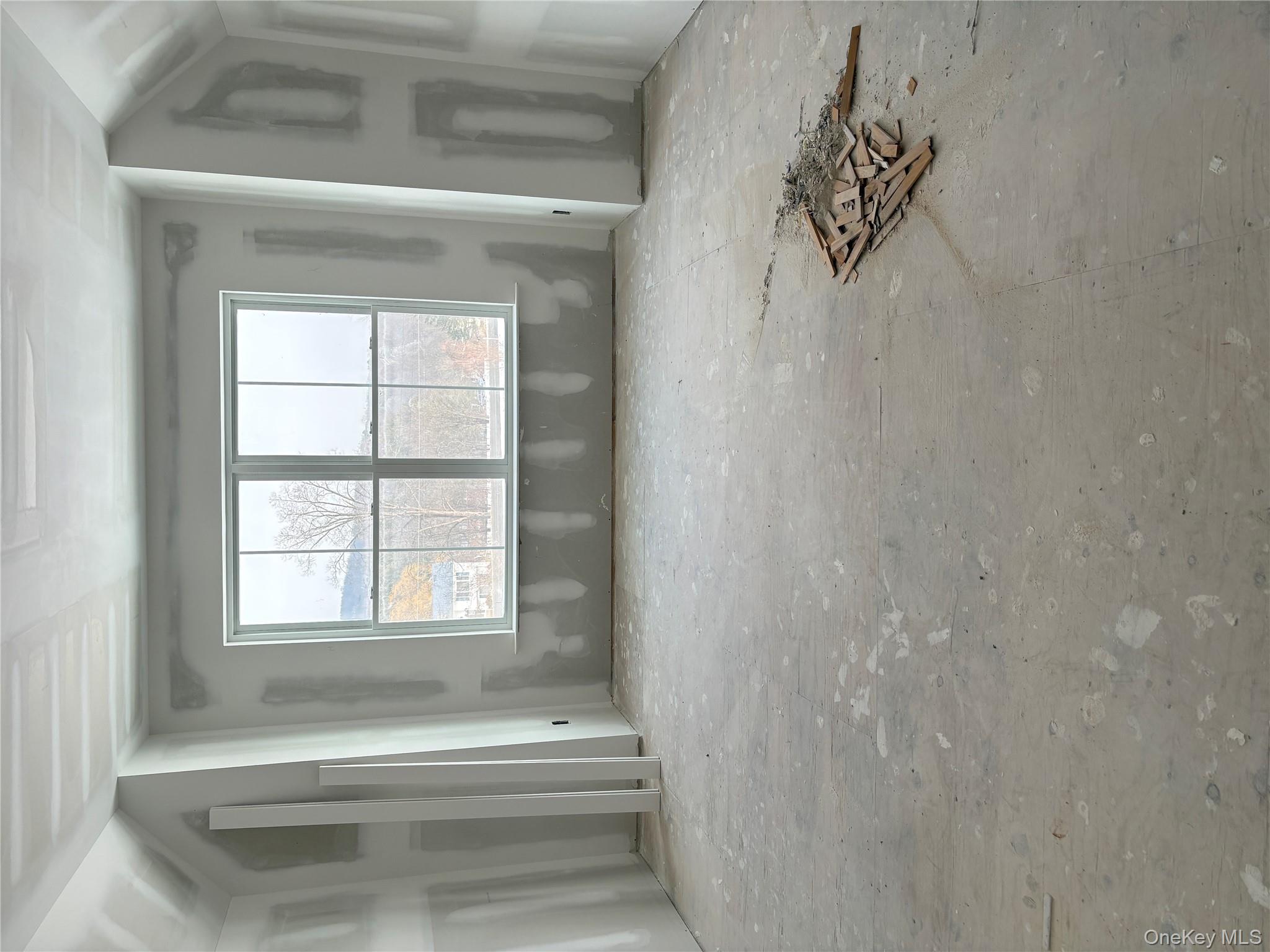 75 Delmar Hill Road Slate Hill, NY 10973 - Photo 17 of 23 an empty room with windows