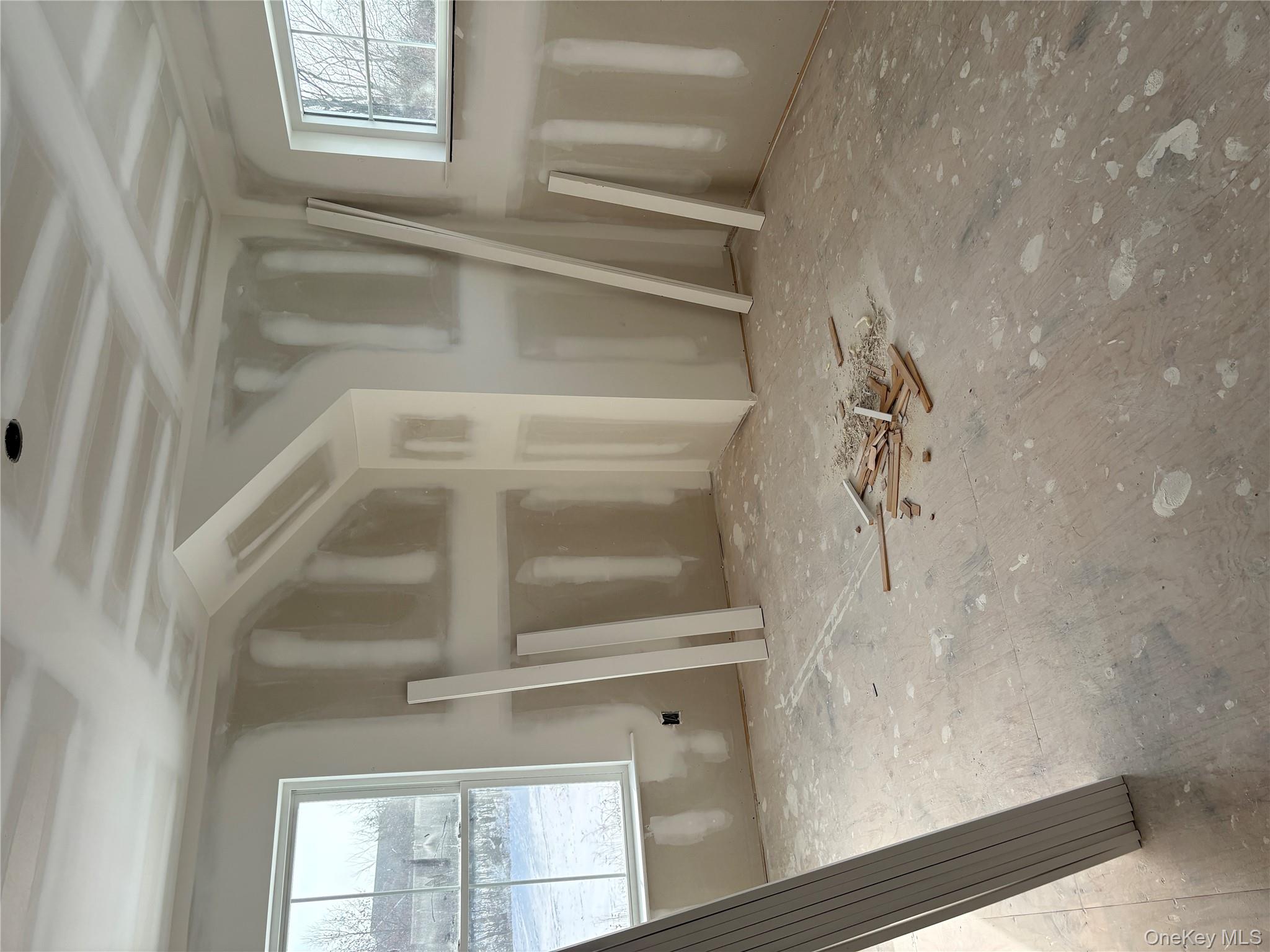 75 Delmar Hill Road Slate Hill, NY 10973 - Photo 22 of 23 a view of a livingroom with wooden floor and a window