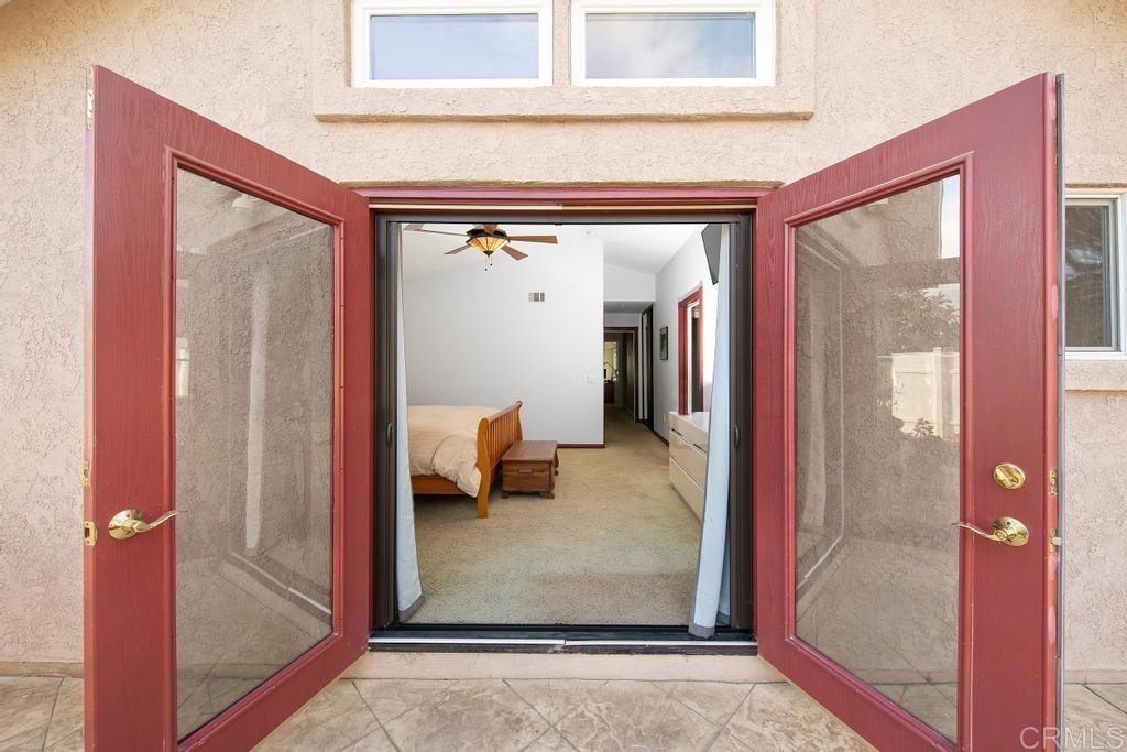 4730 Edinburgh Drive Carlsbad, CA 92010 - Photo 17 of 33 a view of a hallway with a living room