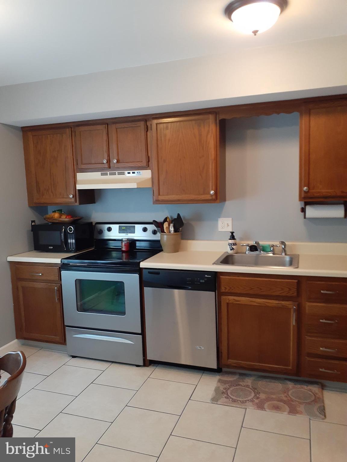 75 Azalea Way Reading, PA 19606 - Photo 6 of 26 Kitchen , tile and stainless appliances