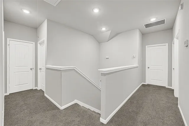 a view of hallway with stairs