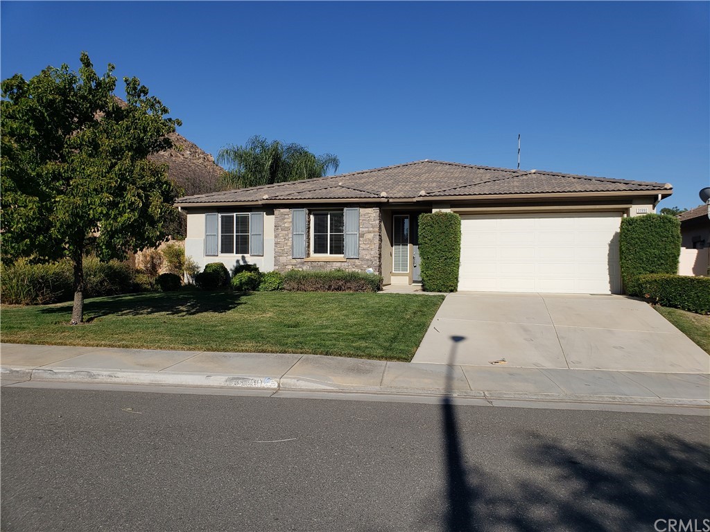 a house view with a garden space