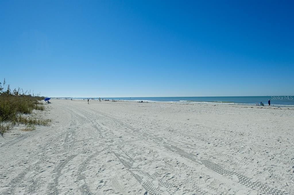 7151 Sunset Way, Unit 10 St. Pete Beach, FL 33706 - Photo 26 of 33 a view of an ocean beach