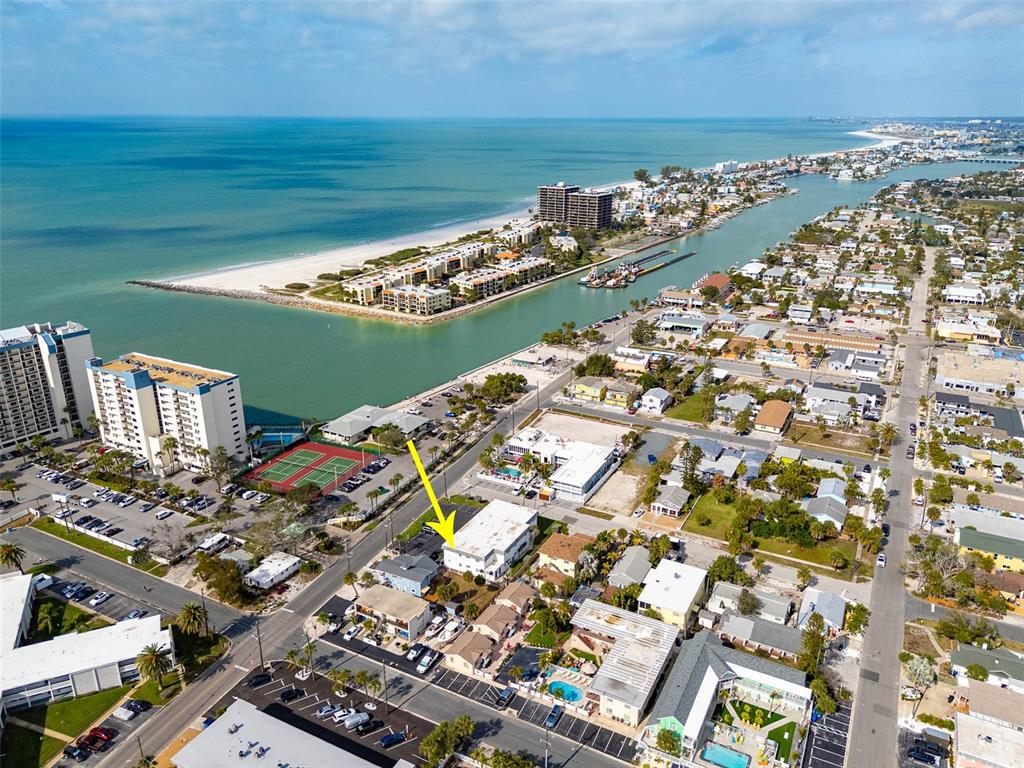 7151 Sunset Way, Unit 10 St. Pete Beach, FL 33706 - Photo 29 of 33 an aerial view of a city