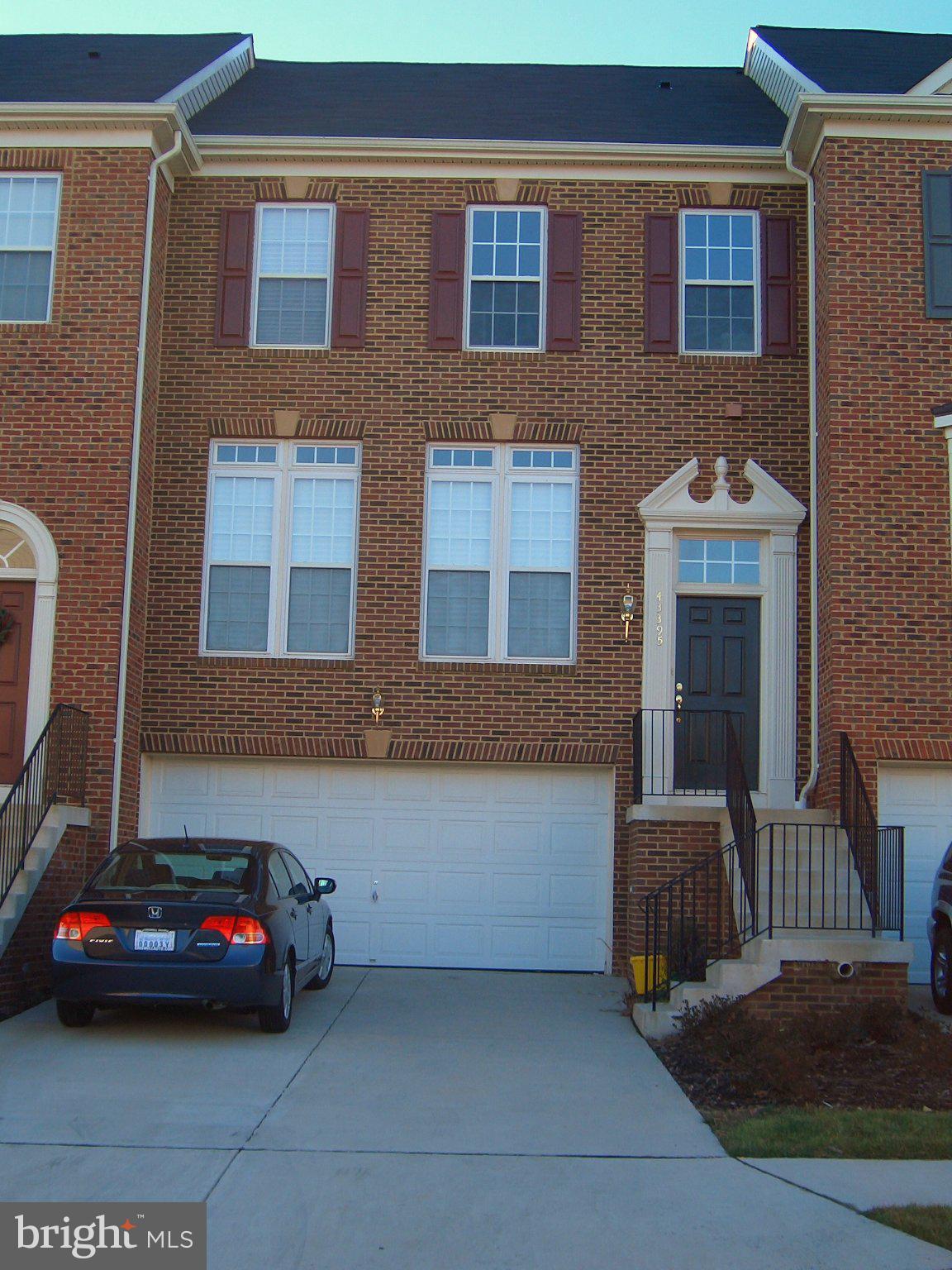43395 Allisons Ridge Terrace Ashburn, VA 20148 - Photo 1 of 32 Charming brick townhouse with curb appeal.