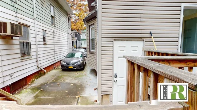 a house view with a backyard space