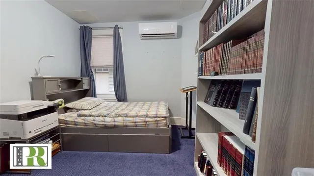 a room with bed and a window