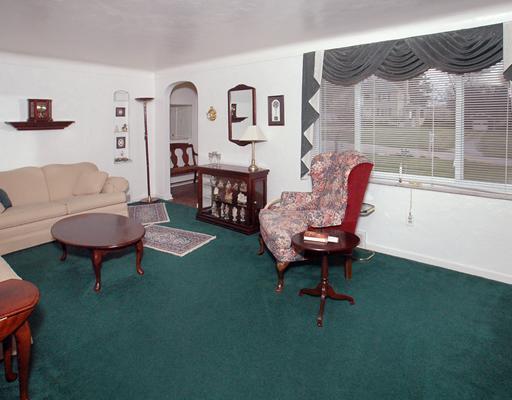 138 Murrysville Road Level Green, PA 15085 - Photo 4 of 18 Living Room. The living room is very large and includes coved ceilings, new windows, and archways into the foyer and also into the newly remodeled kitchen.