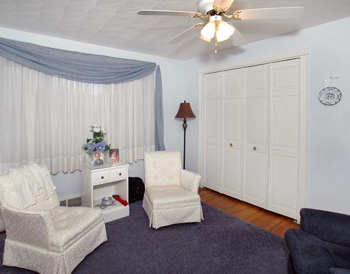 138 Murrysville Road Level Green, PA 15085 - Photo 7 of 18 Bedroom. This is the smaller of the main floor bedrooms and oozes charm with the over sized windows and hardwood floors.