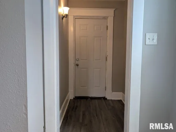 a view of hallway with stairs