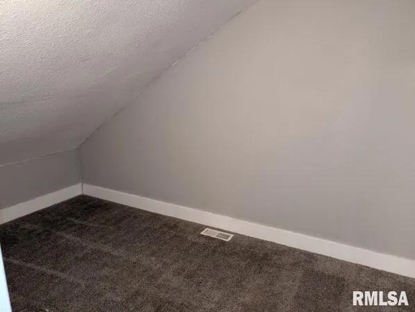 a bathroom with a toilet a sink and bathtub