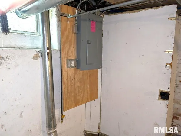 a bathroom with a shower and a sink