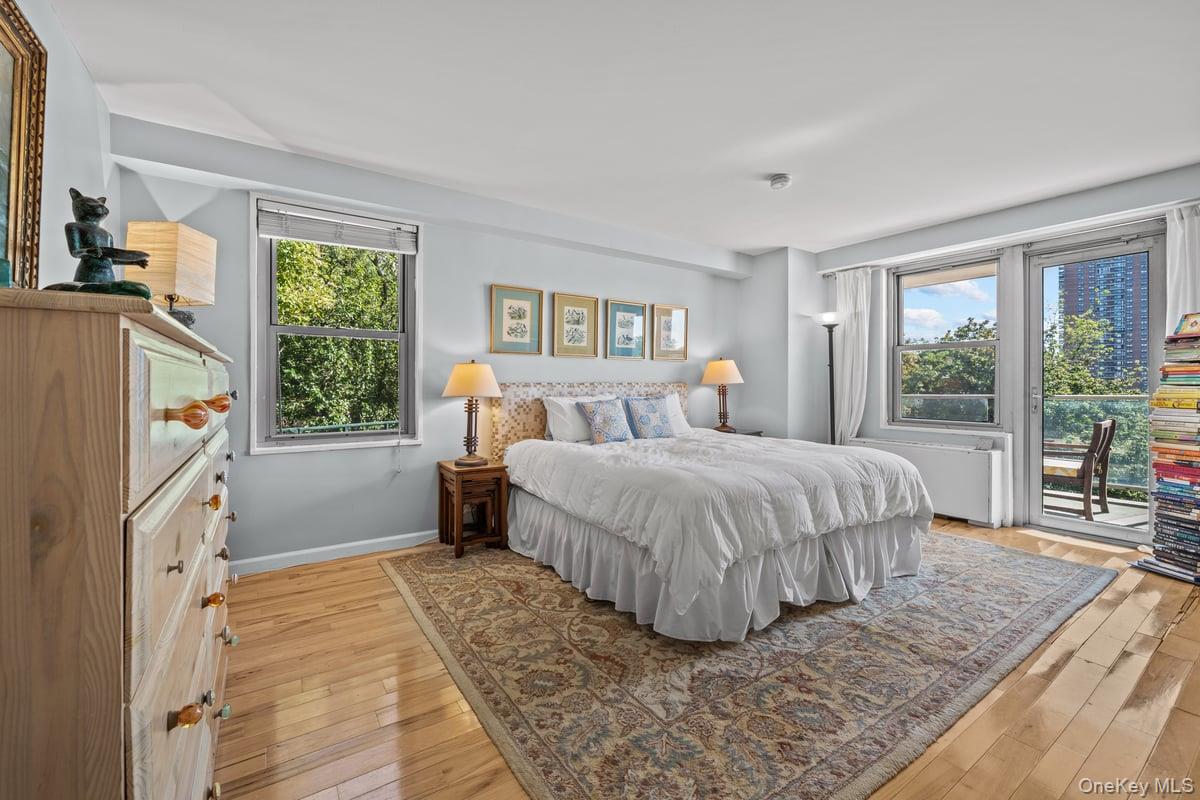 2500 Johnson Avenue North, Unit 2NP Bronx, NY 10463 - Photo 17 of 45 Bedroom with access to outside and light wood-style floors