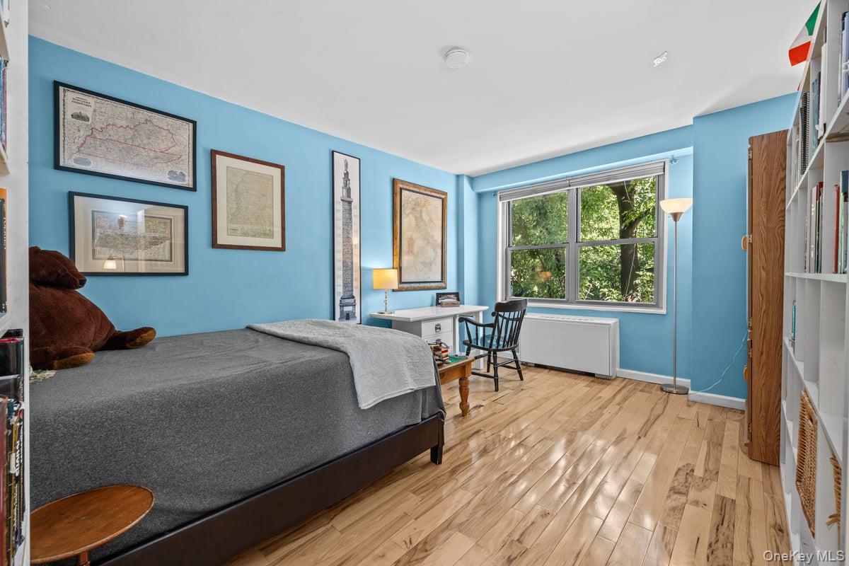 2500 Johnson Avenue North, Unit 2NP Bronx, NY 10463 - Photo 21 of 45 Bedroom with light wood finished floors and baseboards