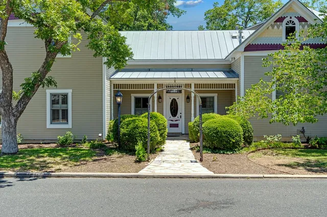 front view of house with a small yard