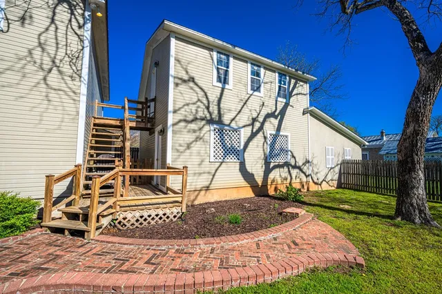 a kitchen with a sink cabinets and appliances