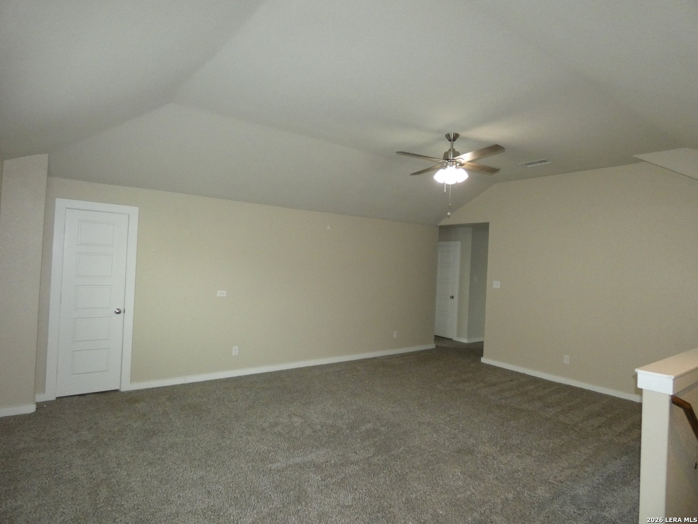 10503 Pablo Way Converse, TX 78109 - Photo 11 of 21 an empty room with a ceiling fan and a window