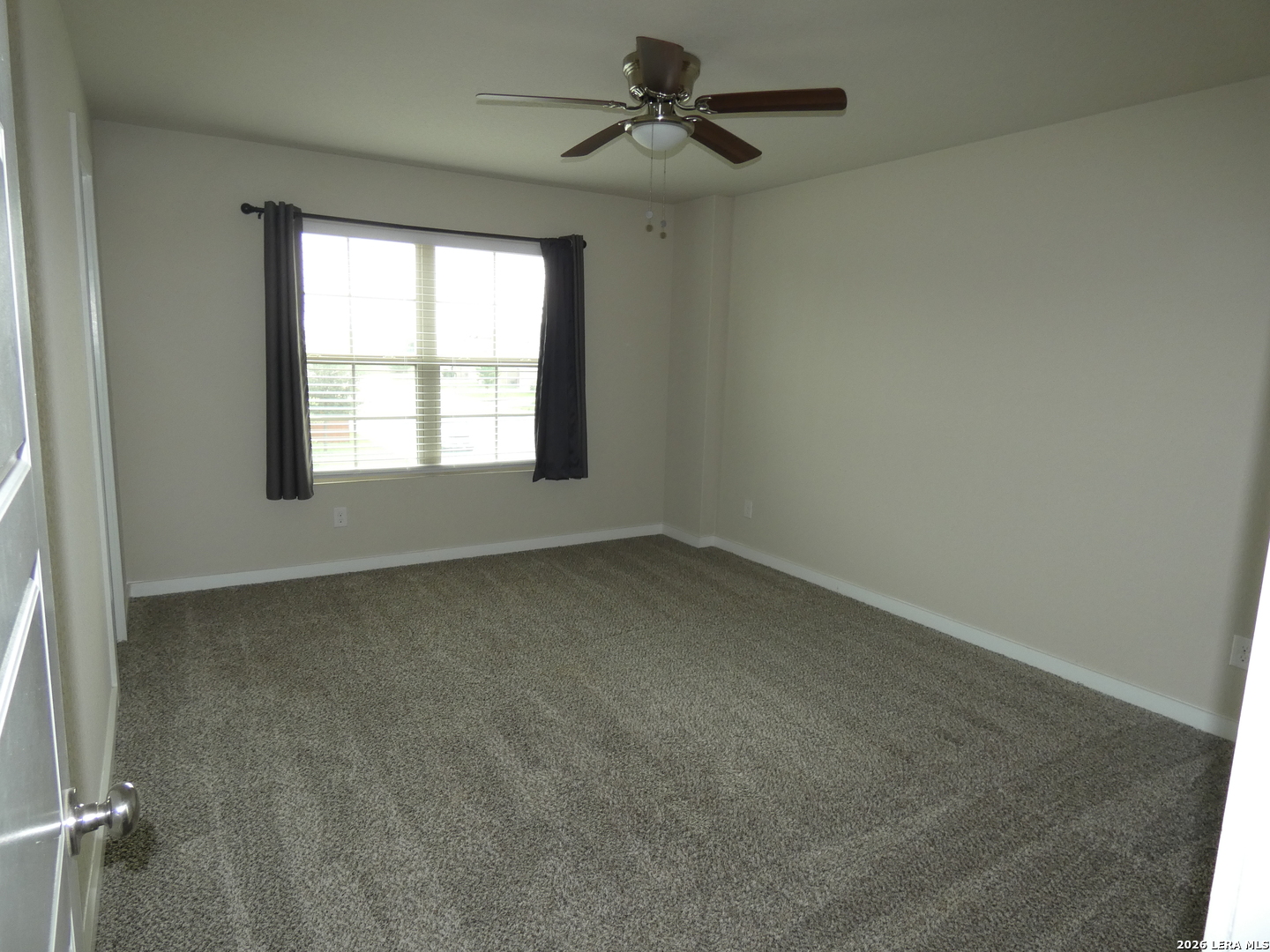 10503 Pablo Way Converse, TX 78109 - Photo 15 of 21 an empty room with a window