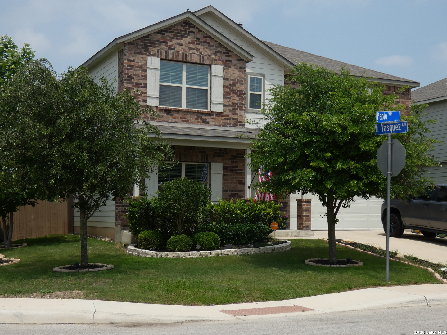 10503 Pablo Way Converse, TX 78109 - Photo 2 of 21 a front view of a house with a yard