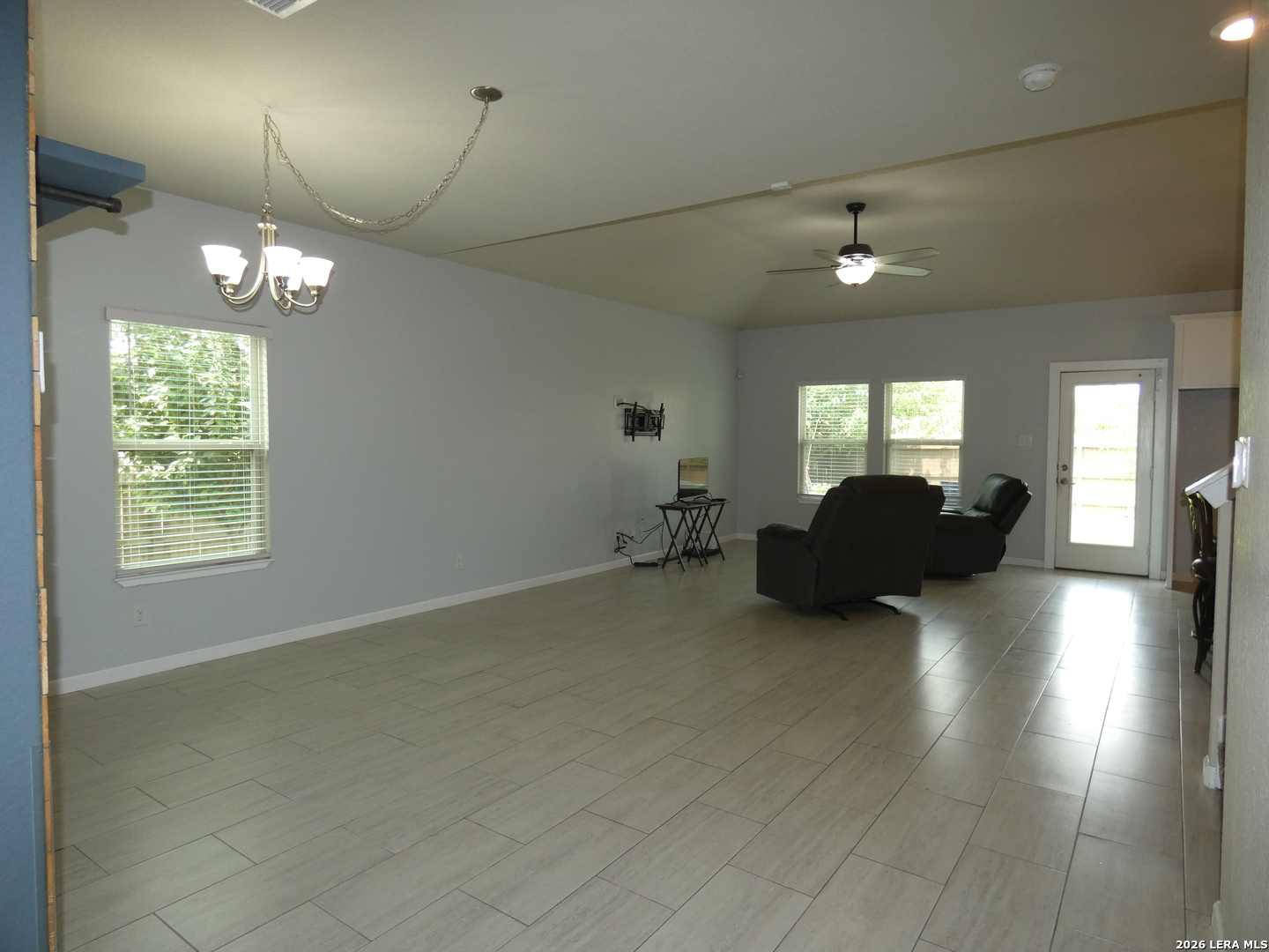 10503 Pablo Way Converse, TX 78109 - Photo 5 of 21 a living room with furniture and a chandelier
