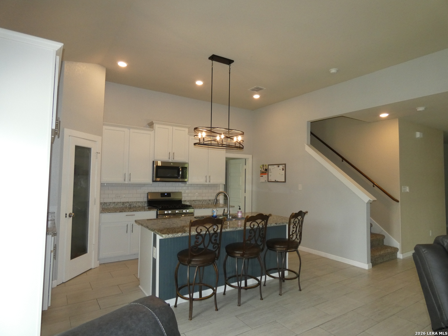 10503 Pablo Way Converse, TX 78109 - Photo 8 of 21 a kitchen that has a table and chairs in it