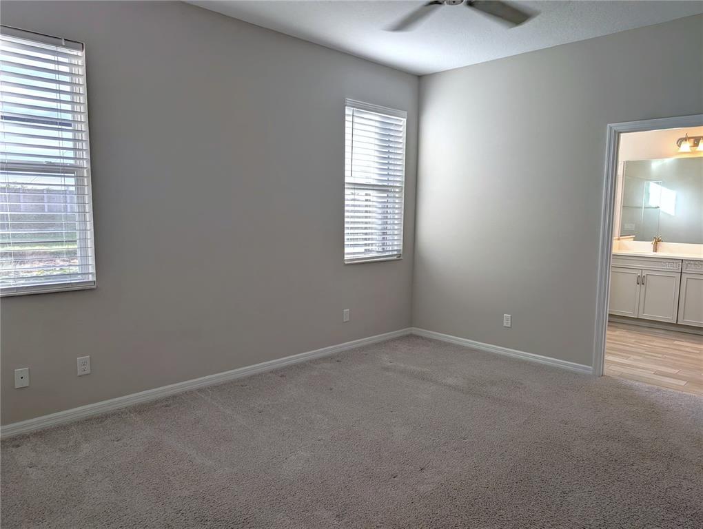 8545 Cache Drive Sarasota, FL 34240 - Photo 12 of 38 an empty room with windows