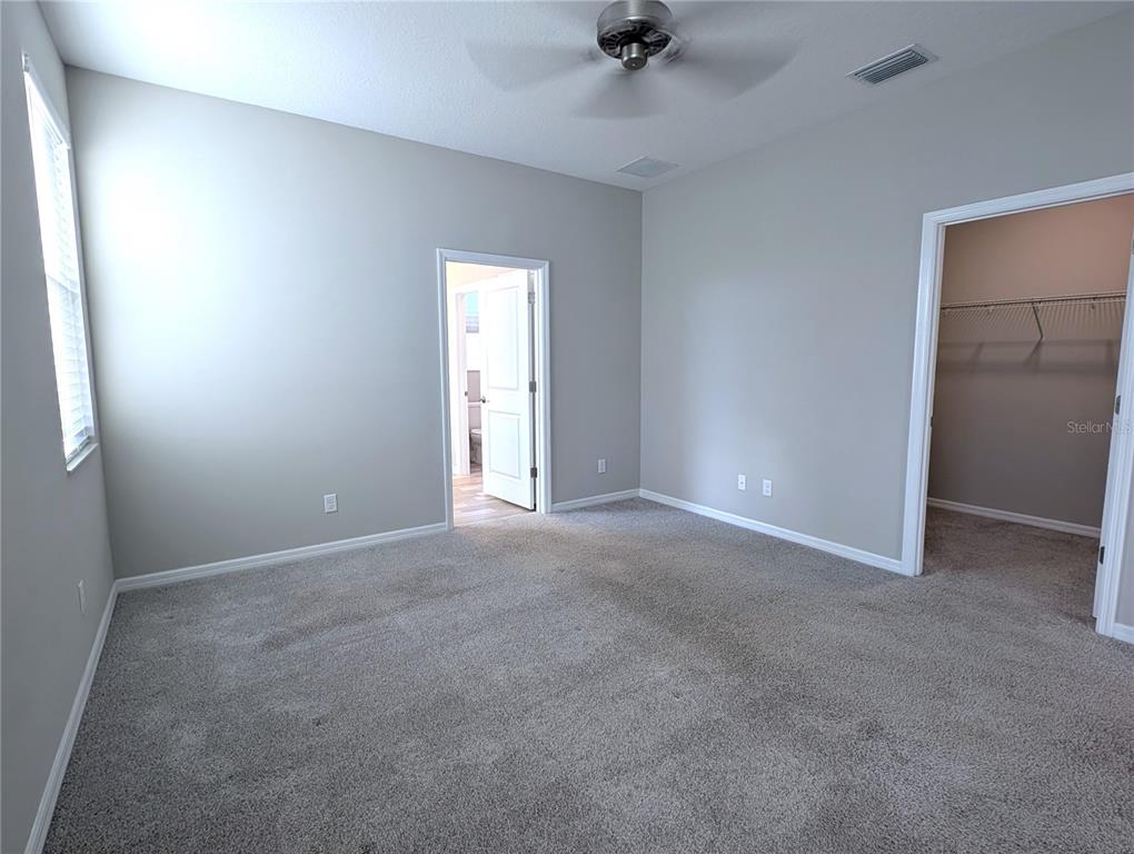 8545 Cache Drive Sarasota, FL 34240 - Photo 13 of 38 a view of an empty room with a window