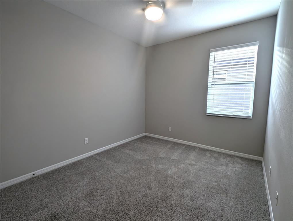 8545 Cache Drive Sarasota, FL 34240 - Photo 18 of 38 an empty room with a window
