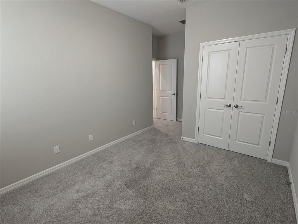 8545 Cache Drive Sarasota, FL 34240 - Photo 19 of 38 a view of an empty room and closet area