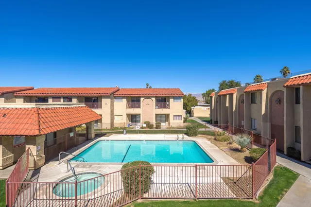 a view of swimming pool with patio