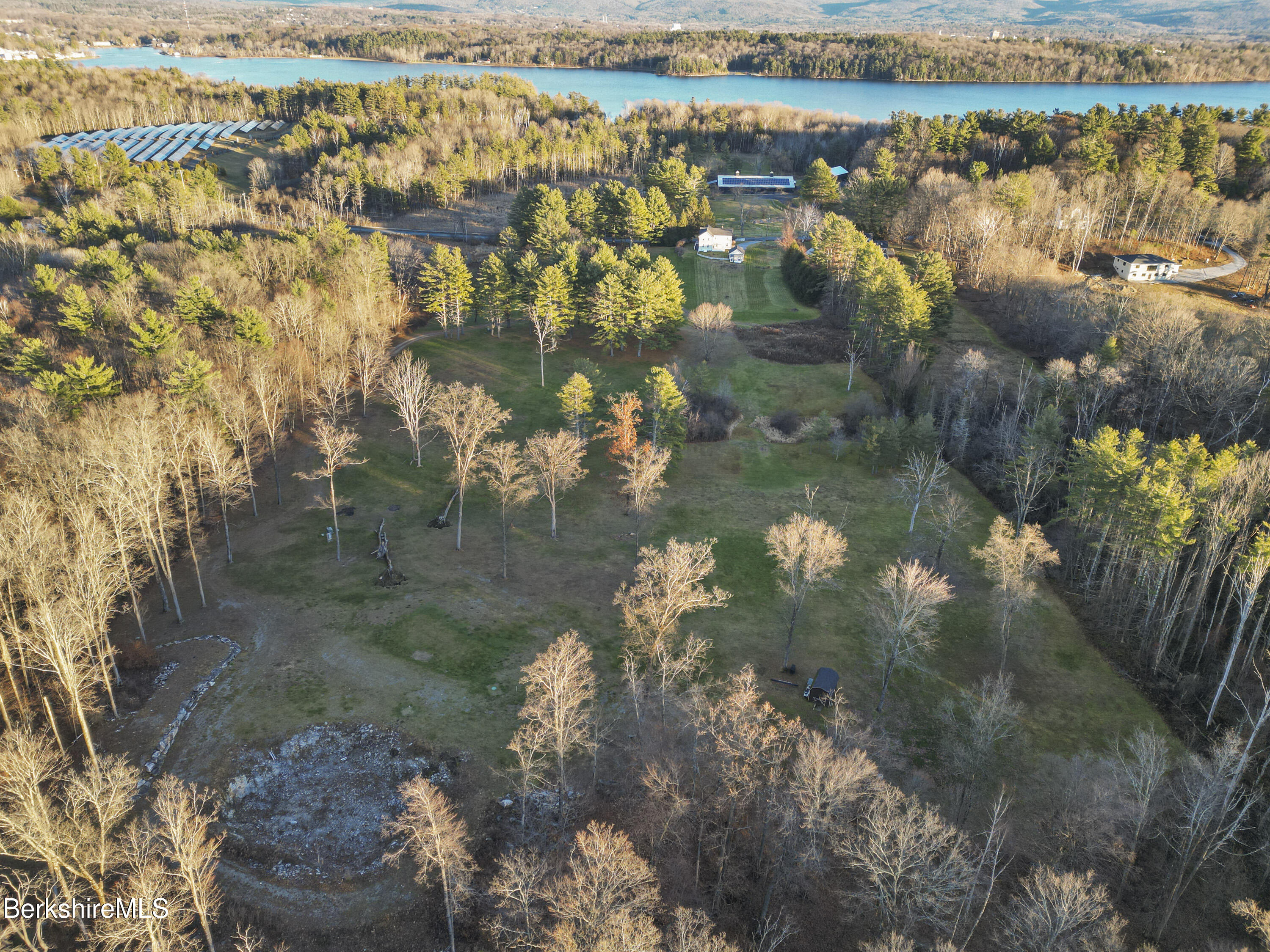 411 Churchill Street Pittsfield, MA 01201 - Photo 9 of 11 a view of lake with a yard