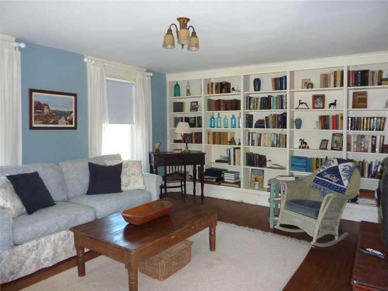 34 Bristol Road Damariscotta, ME 04543 - Photo 5 of 17 Living Room. Wall of built-ins in...