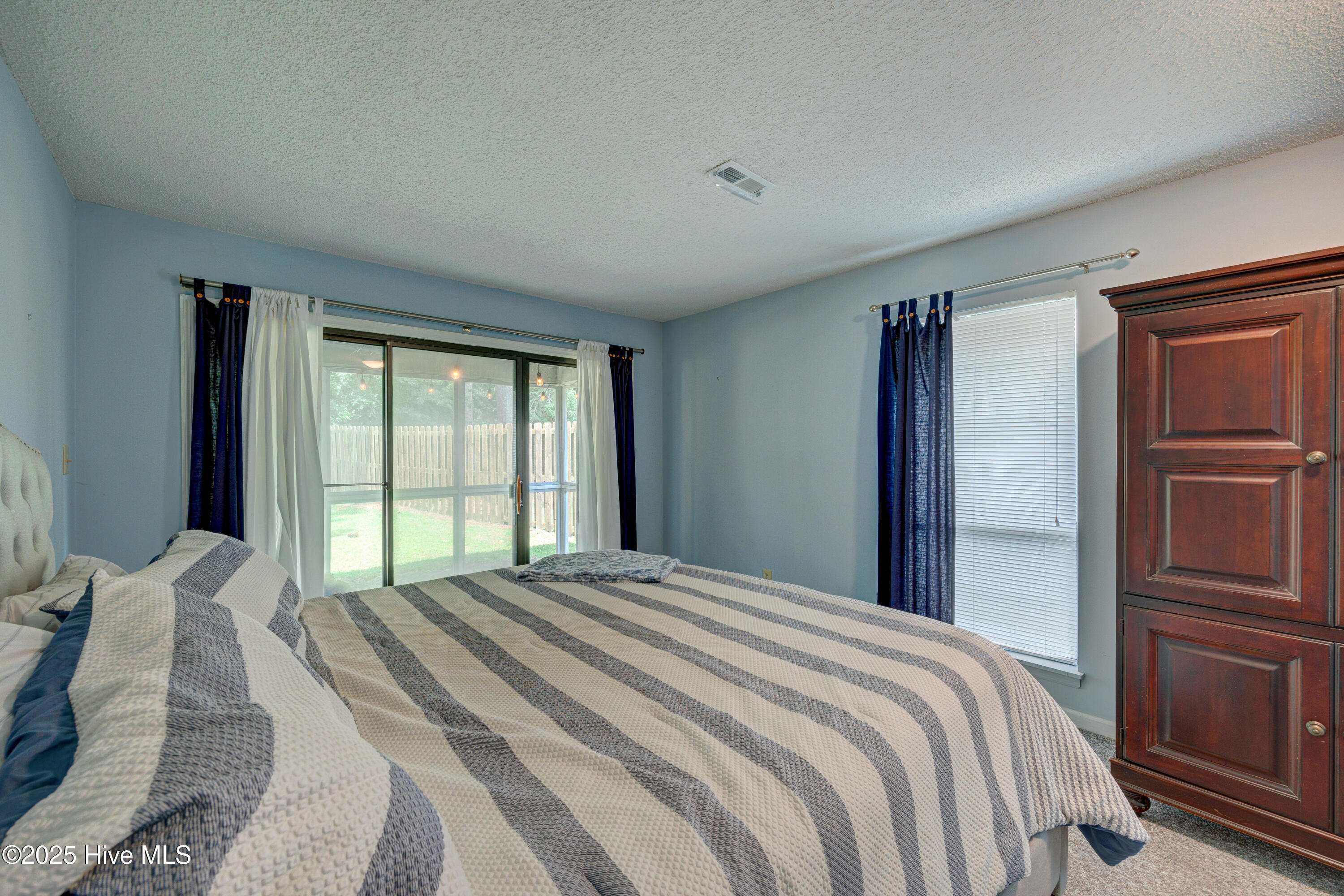 103 Holly Tree Lane Hampstead, NC 28443 - Photo 22 of 36 Primary Bedroom