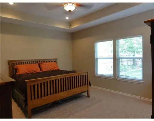 a view of a balcony with furniture